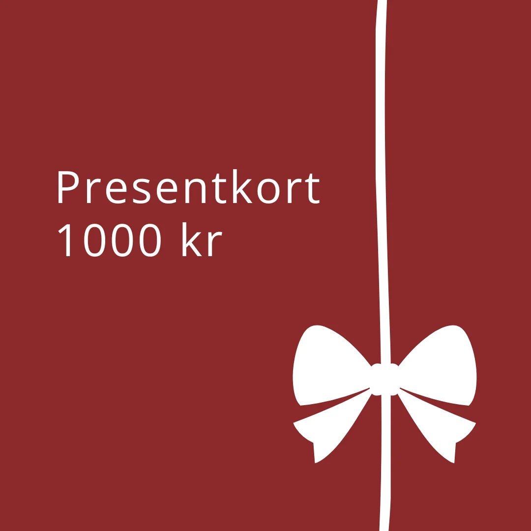 Presentkort_1000_kr Presentkort på 1000 kronor med röd bakgrund och vit rosett.